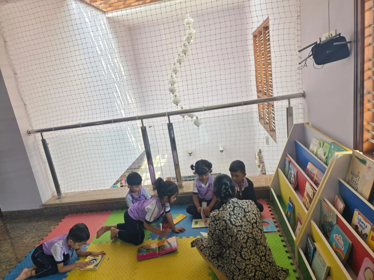 Children reading in the library at FlyHigh