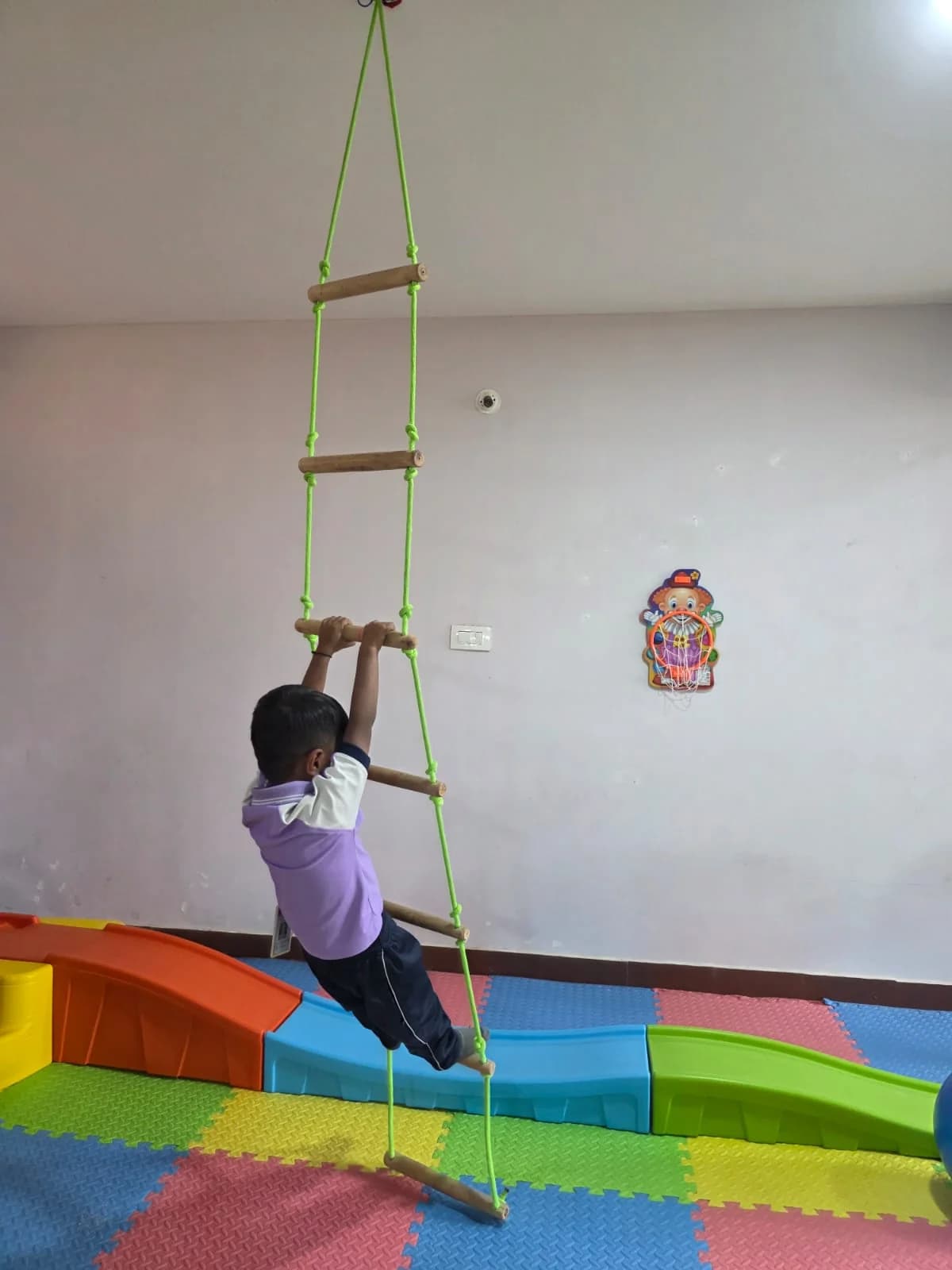 Child climbing the rope ladder at FlyHigh